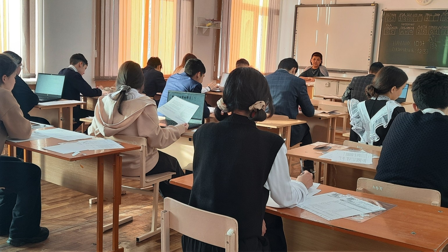 Әбйәлилда туғыҙынсылар белемен һынай